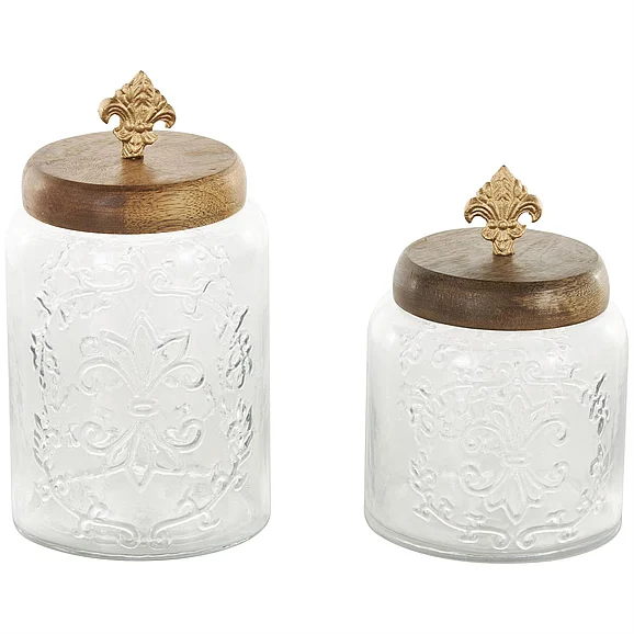 UMA Clear Glass Scroll Living Room Decorative Jars with Brown Wooden Lids and Gold Fleur-De- Lis Knobs, Set of 2 9, 7H | 14038 CLOSEOUT