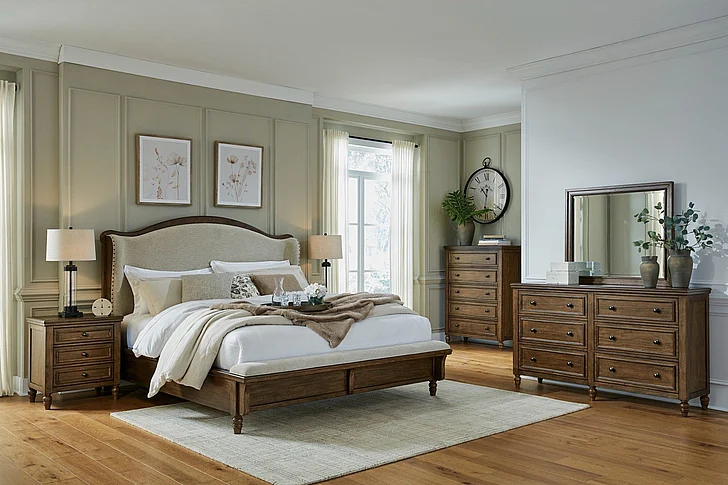 Sturlayne 4-Piece Upholstered Panel Bedroom Set in Brown